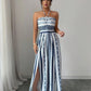 👗50% הנחה עכשיו!💥אוברול גיאומטרי עם מחשוף הלטר וחתך בצד – הדפס ייחודי וגב אלסטי – רב-תכליתי, מושלם למסיבות קיץ או ללבוש בחופשה ✨