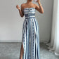 👗50% הנחה עכשיו!💥אוברול גיאומטרי עם מחשוף הלטר וחתך בצד – הדפס ייחודי וגב אלסטי – רב-תכליתי, מושלם למסיבות קיץ או ללבוש בחופשה ✨