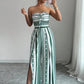 👗💙 אוברול גיאומטרי עם מחשוף הלטר וחתך בצד – 50% הנחה! מושלם לחוף, למשרד ולערב. 🔥✨